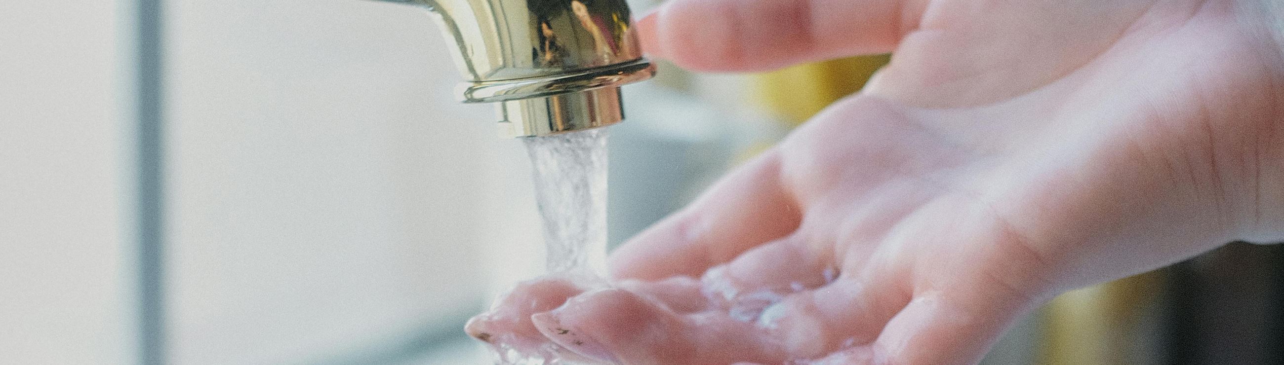 Hand Under Faucet