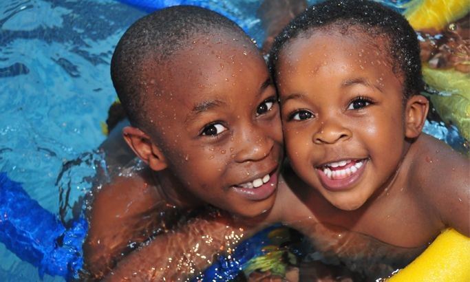 Boys taking swim lessons