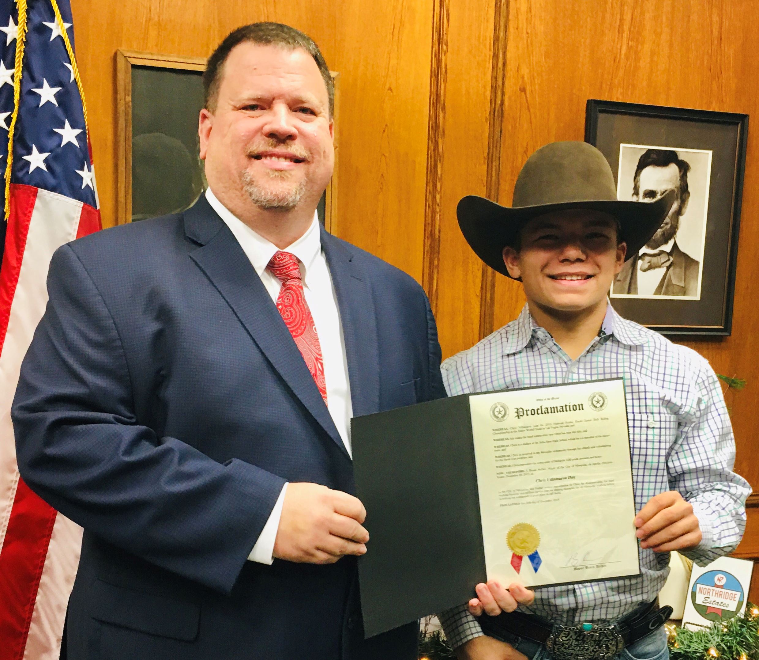 Chris Villanueva, bull riding champion and Mayor Bruce Archer