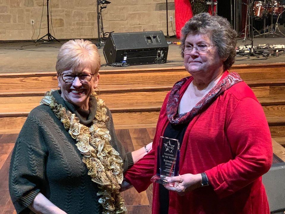 Barbara Dunn receives the volunteer of the decade award for MCPAAA