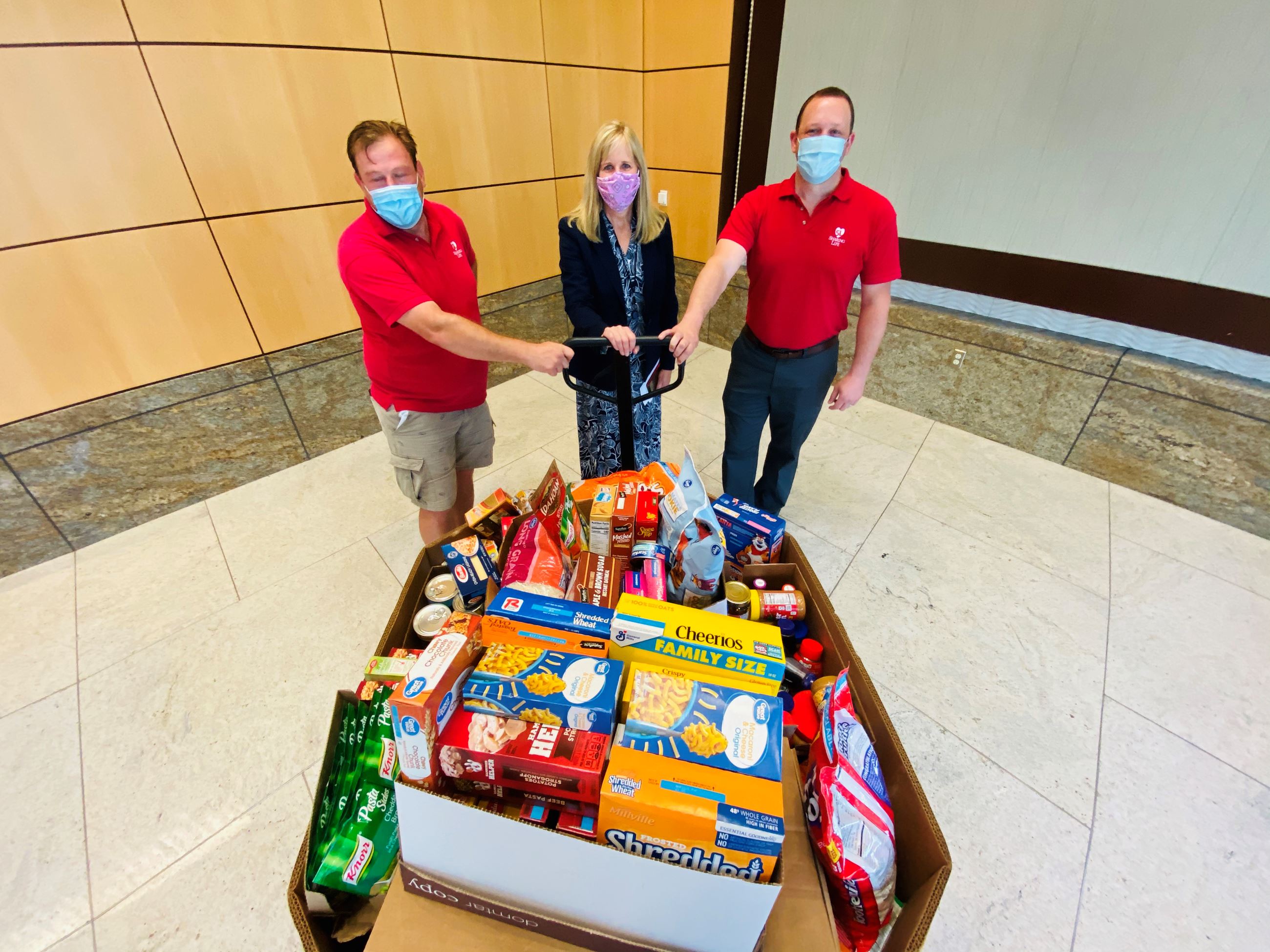 6-29-20 Mesquite Dir of Finance Debbie Mol presents food donations to  local food pantries