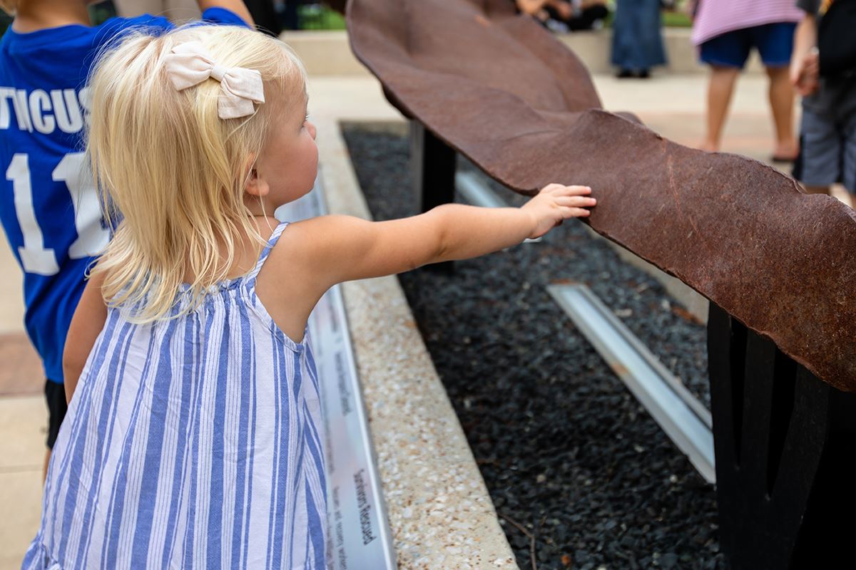 Mesquite Freedom Park - girl touches beam - Mesquite TX