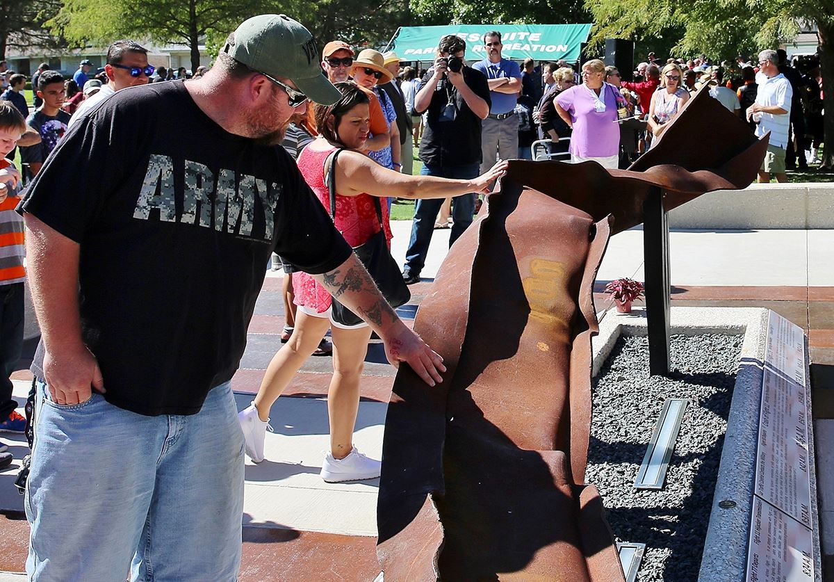 Mesquite Freedom Park - military veteran touches beam - Mesquite TX