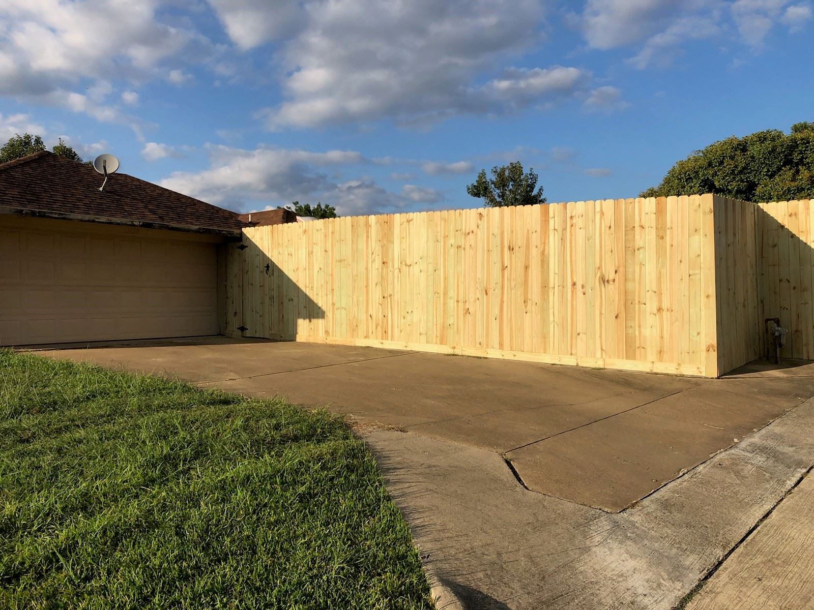 Completed fence built by neighbors