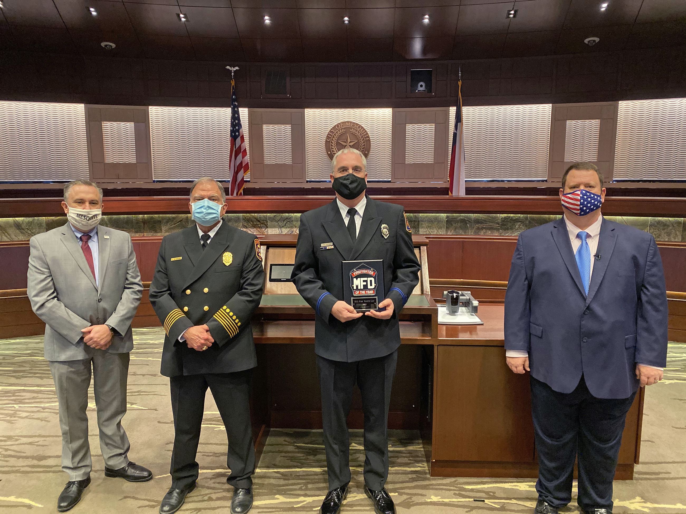 City Manager Cliff Keheley, Fire Chief Russell Wilson, Firefighter of the Year Driver-Engineer Param