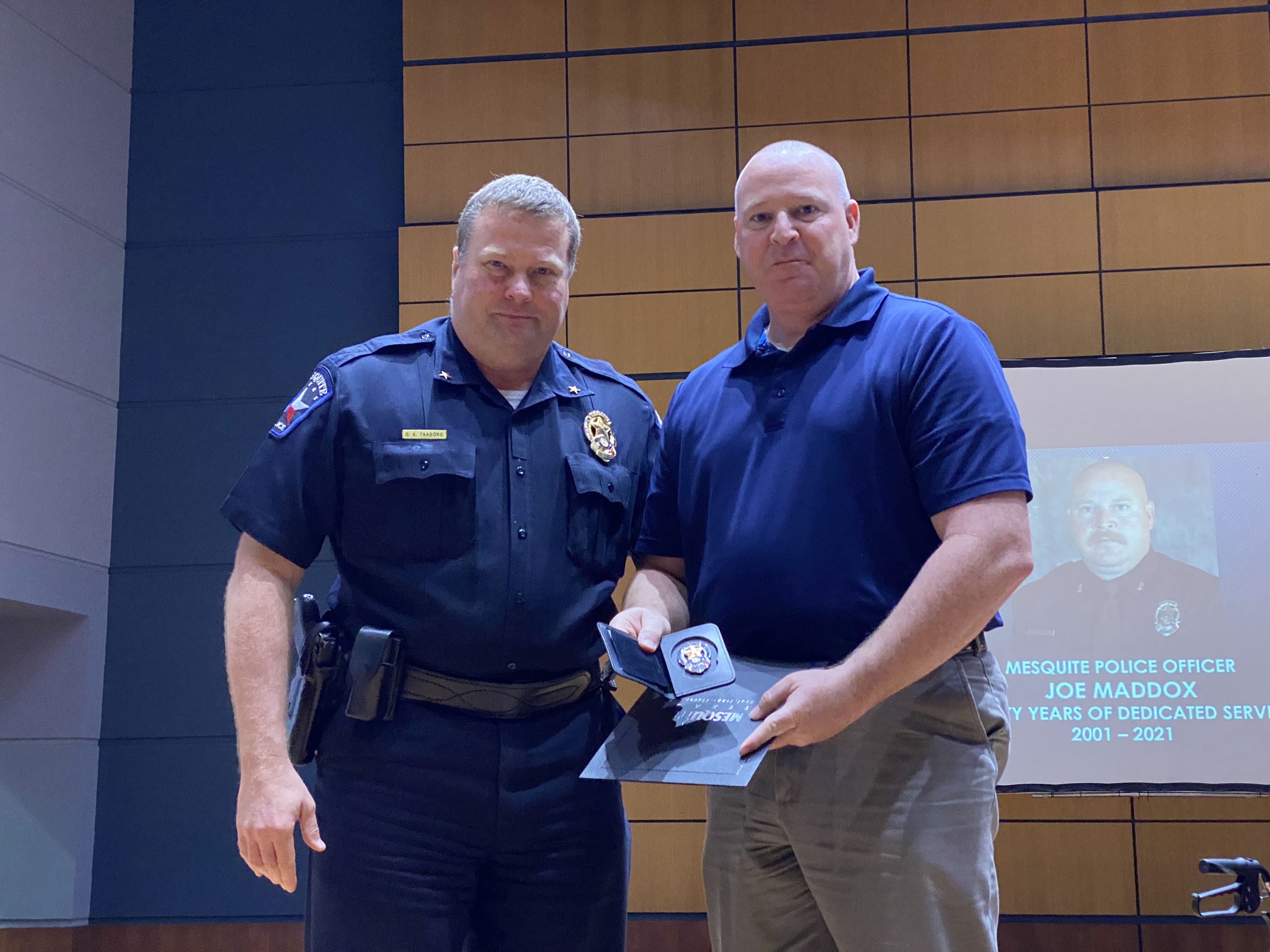 Chief Faaborg presents Maddox his badge