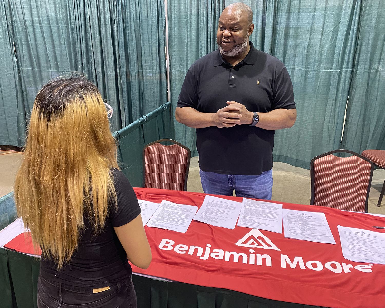 6-9-21 Mesquite Job fair - Benjamin Moore Paint job recruiter speaks with job seeker - Mesquite TX