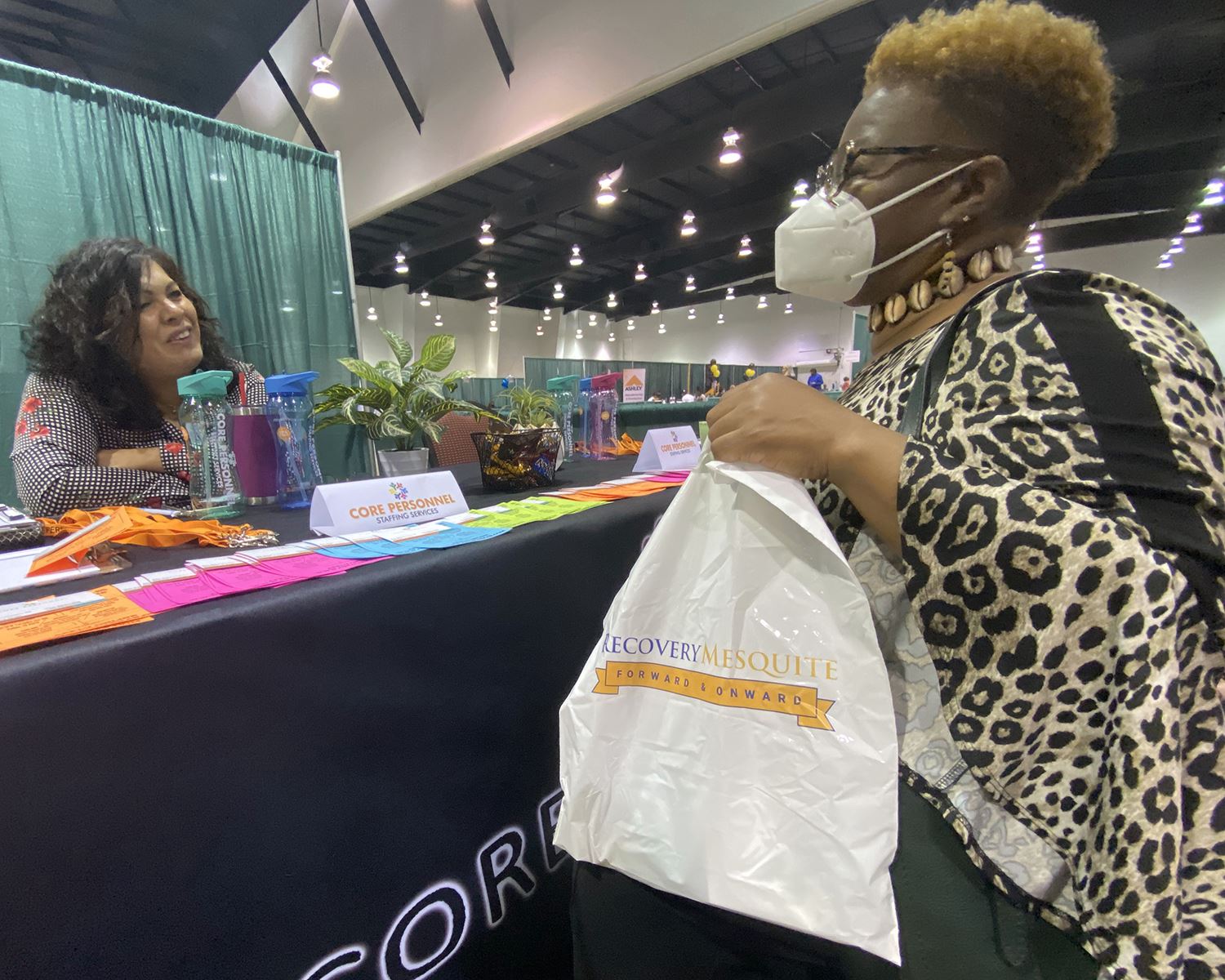 6-9-21 Mesquite Job fair - Core Personnel recruiter speaks with job seeker - Mesquite TX