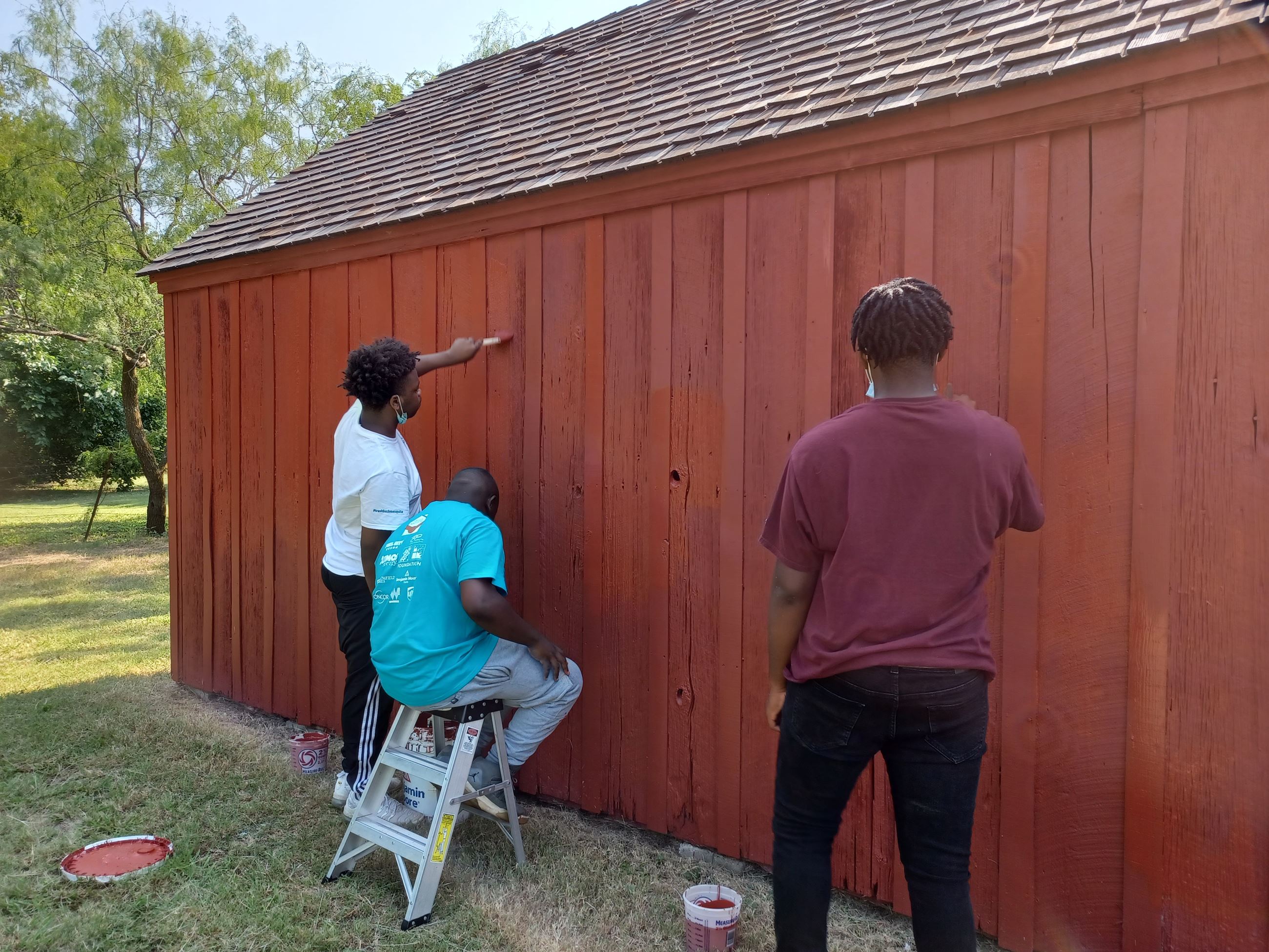 interns paint building