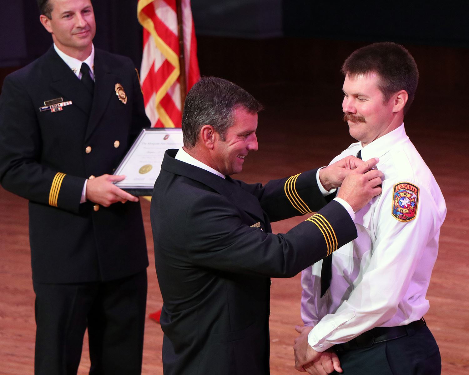 8-5-21 MFD Promotional and Swearing-In Ceremony - Asst. Chief Billy Massey pins badge to Driver-Engi