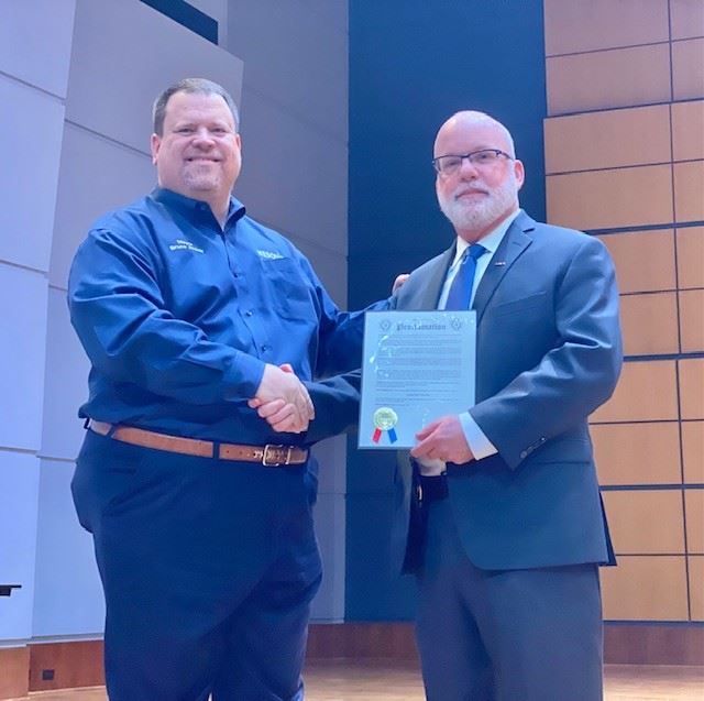 Mayor Archer and Pecena handshake