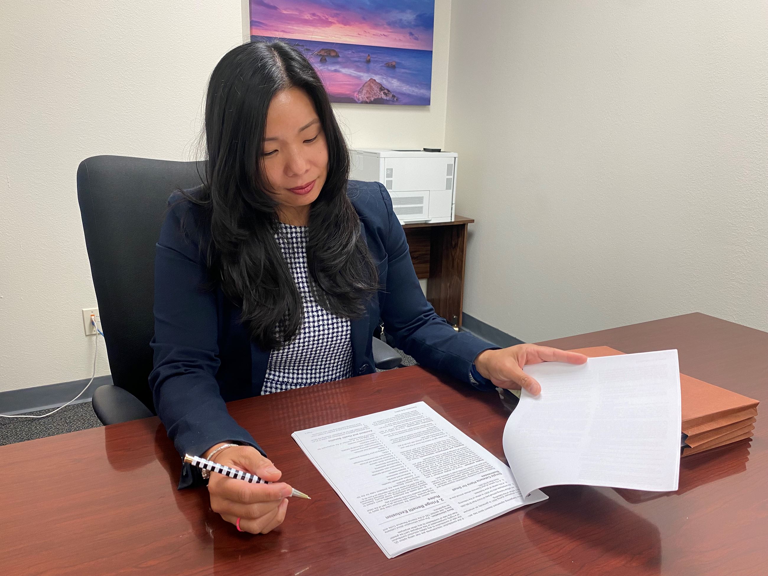 Rita Ballard in office working