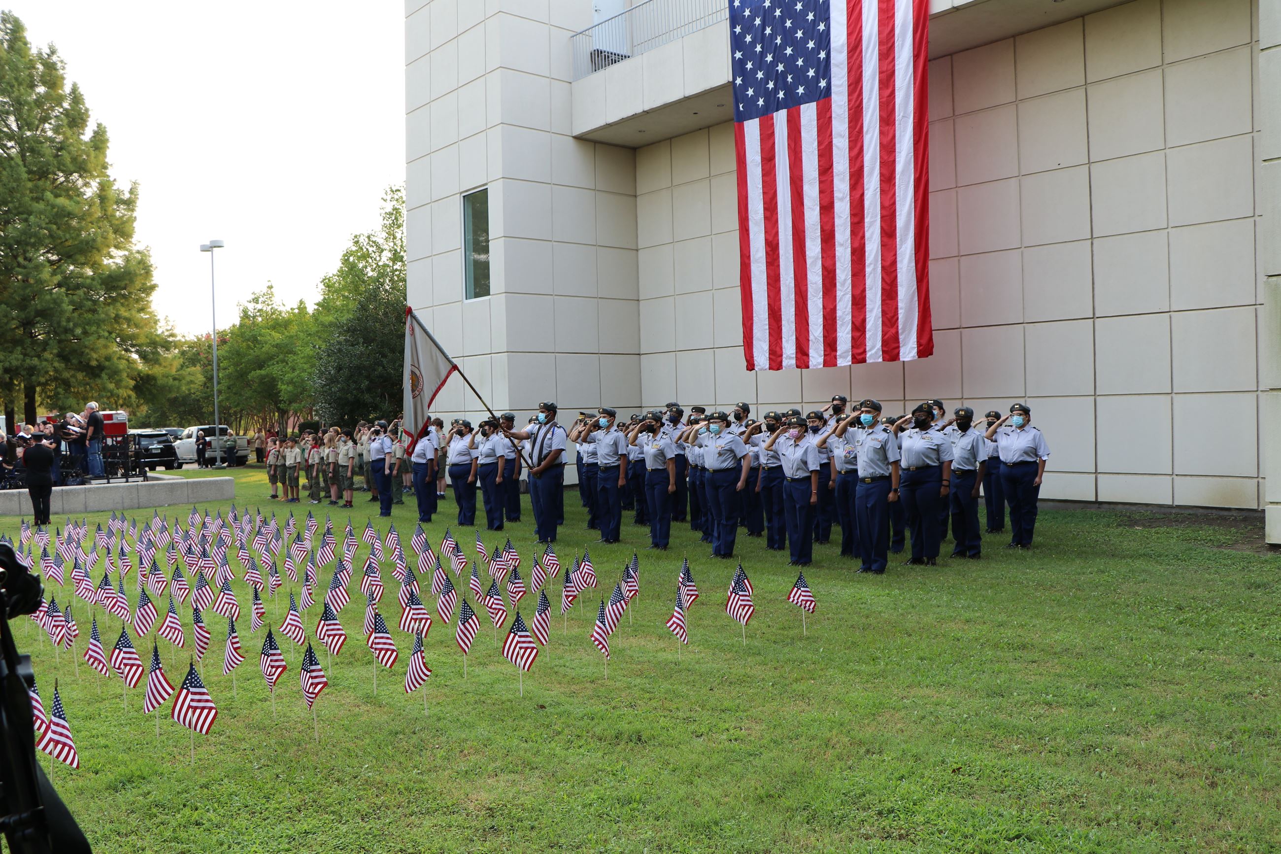 local ROTC and boyscouts lined up