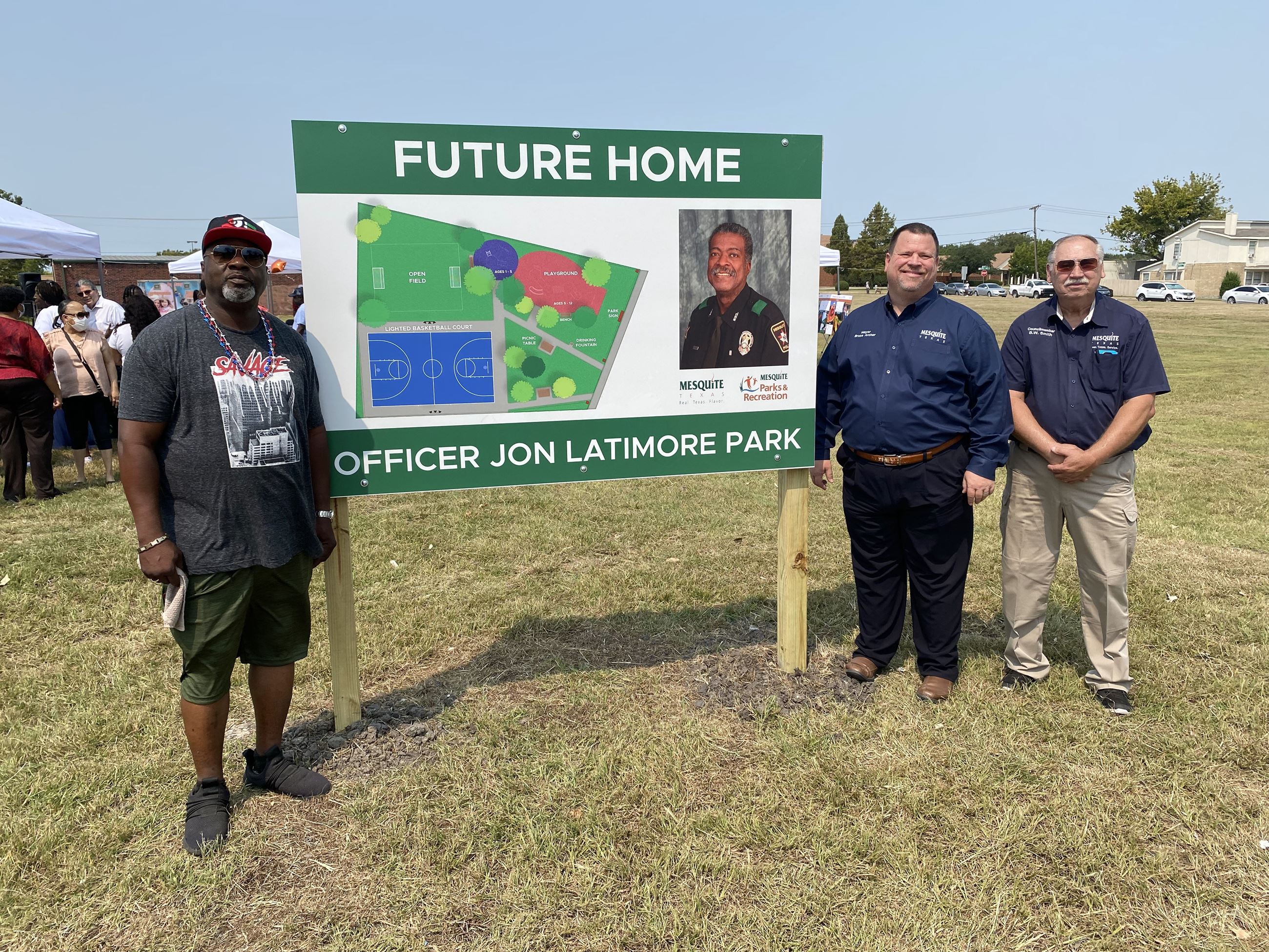 NAACP president, Mayor Archer and councilman BW Smith next to Latimore Park sign