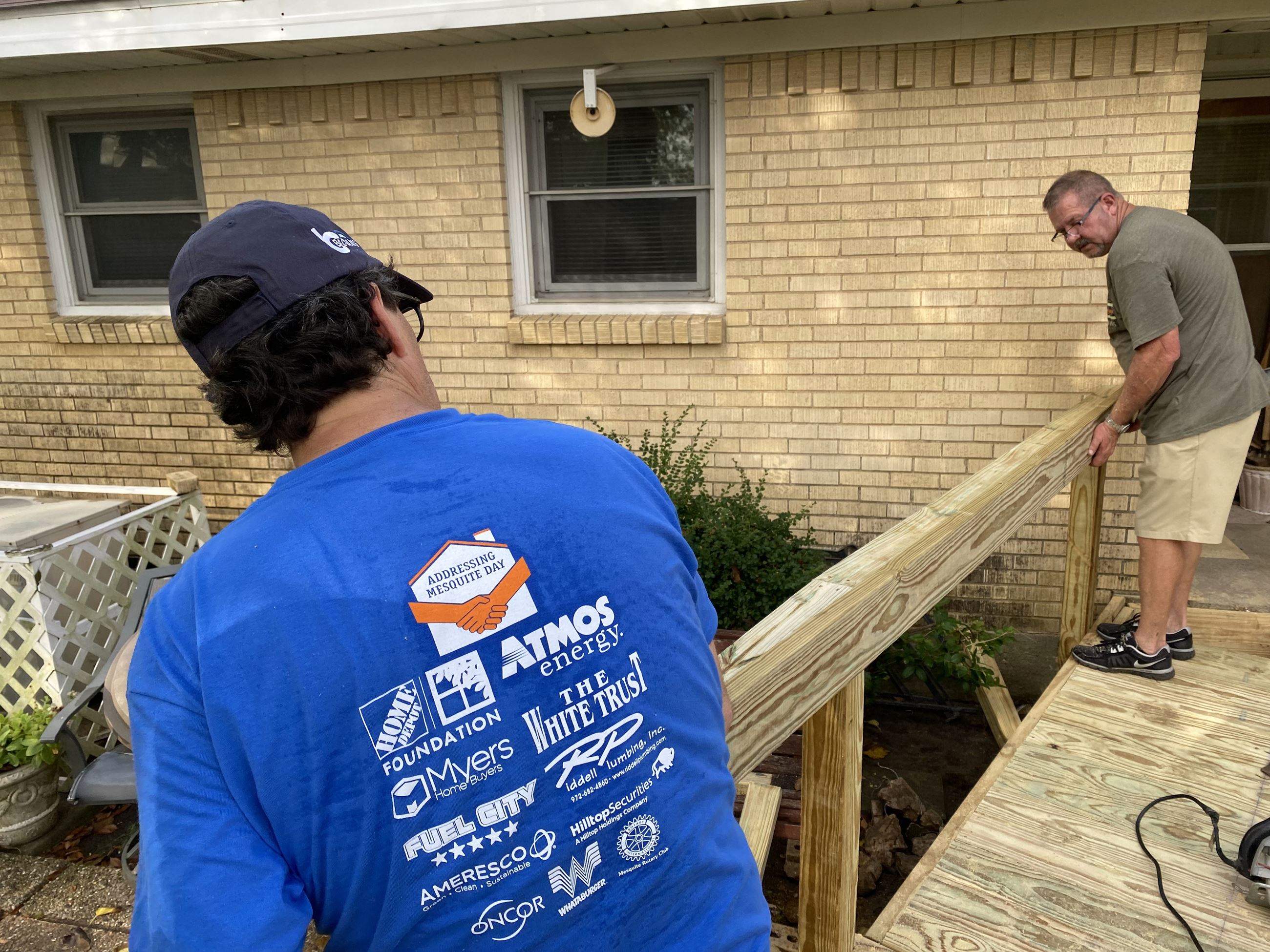 volunteers build ramp
