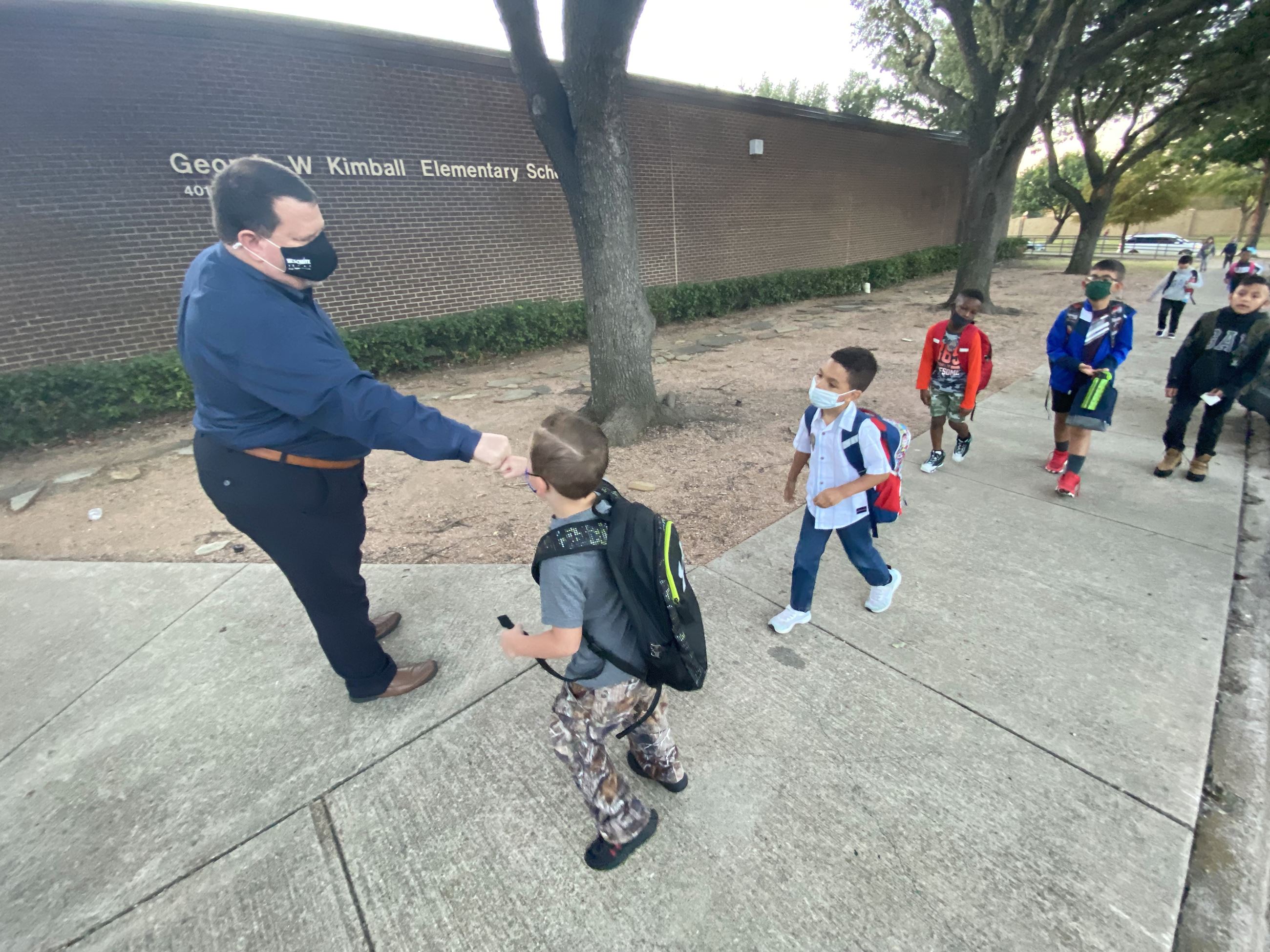 mayor archer greeting kids