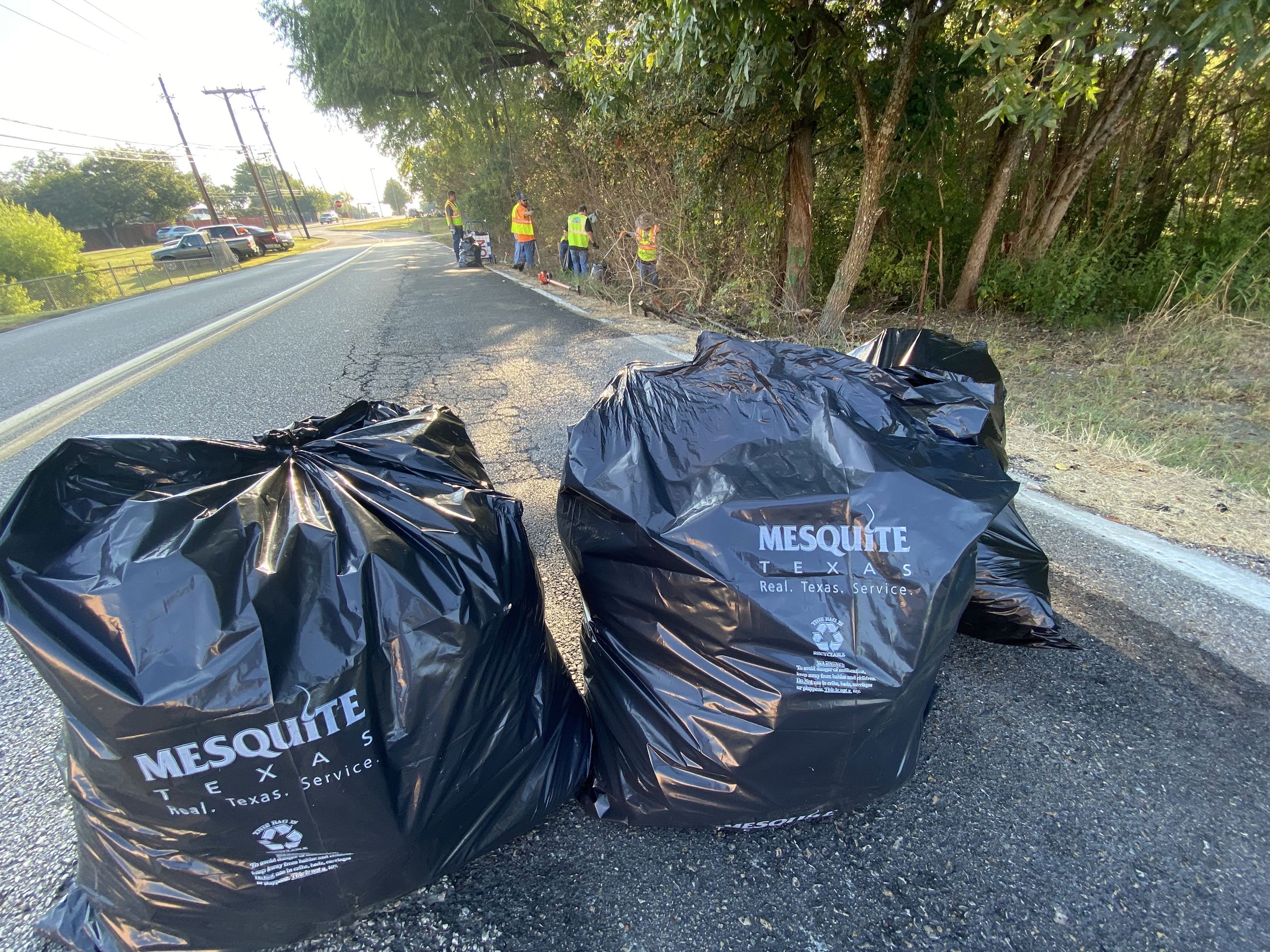 trash bags on the road