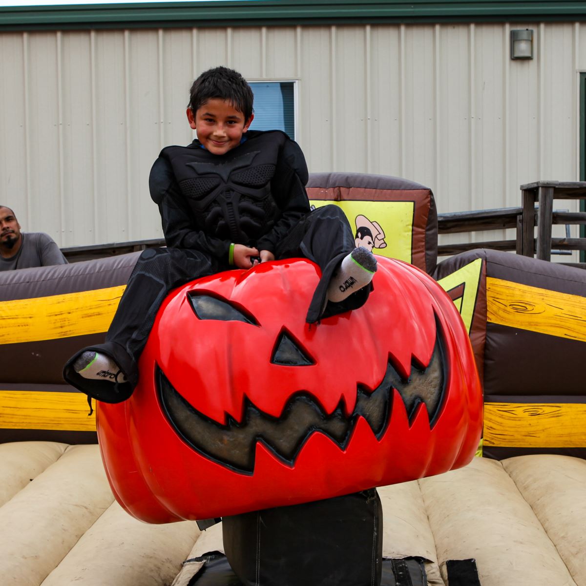 Kid on ride at PumpkinFest - Mesquite, TX
