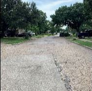 Pavement that needs repair on Flamingo Way